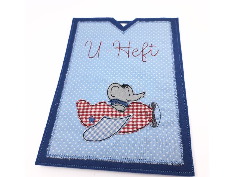 U Heft Hülle Elefant im Flugzeug